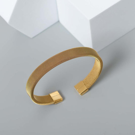 STEEL STRIDE GOLD CUFF