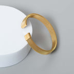 Steel Stride Gold Cuff